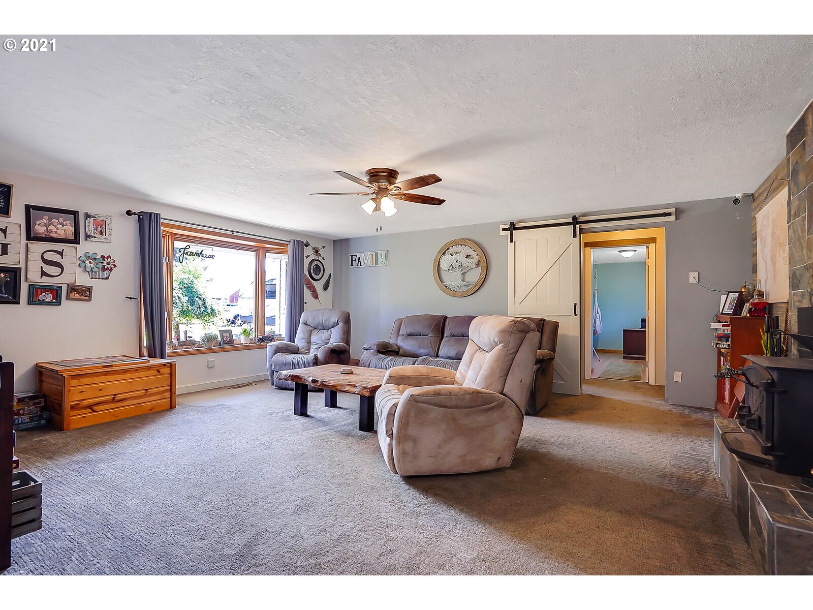 15145 Guthrie Road Dallas, OR 97338 - Photo 7 of 32 a living room with furniture and a window