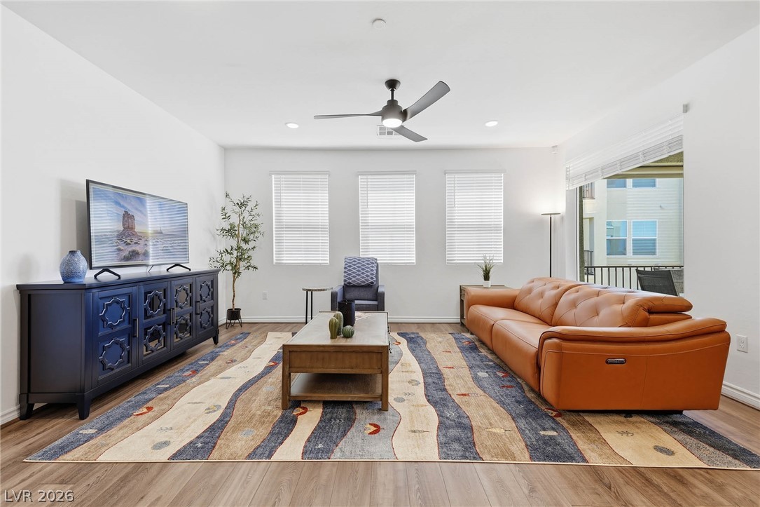 2555 Hampton Road, Unit 7203 Henderson, NV 89052 - Photo 10 of 46 Great Room features luxury vinyl flooring, ceiling fan, window coverings.