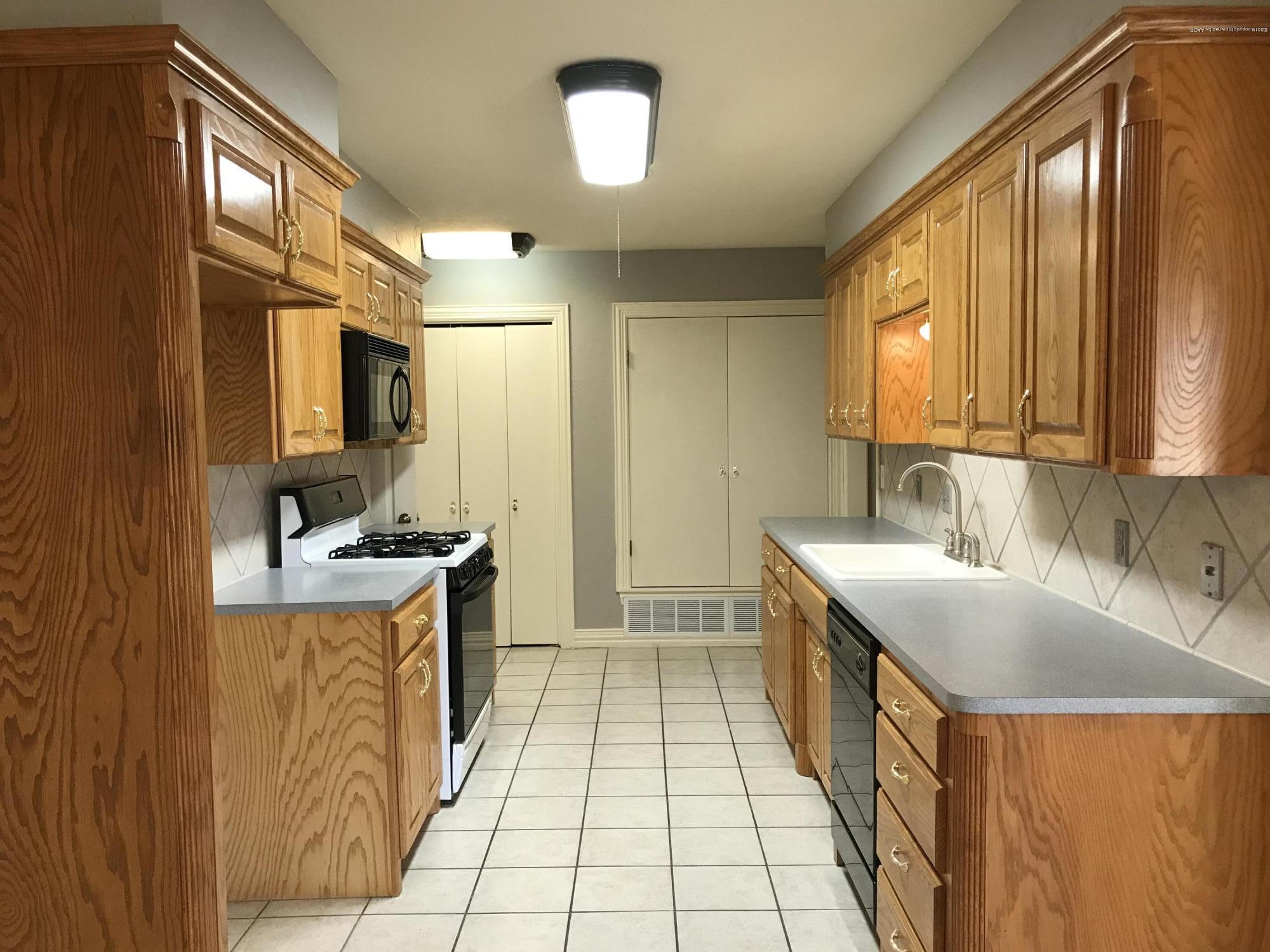 7015 Euclid Street Amarillo, TX 79110 - Photo 8 of 29 Kitchen toward Pantry