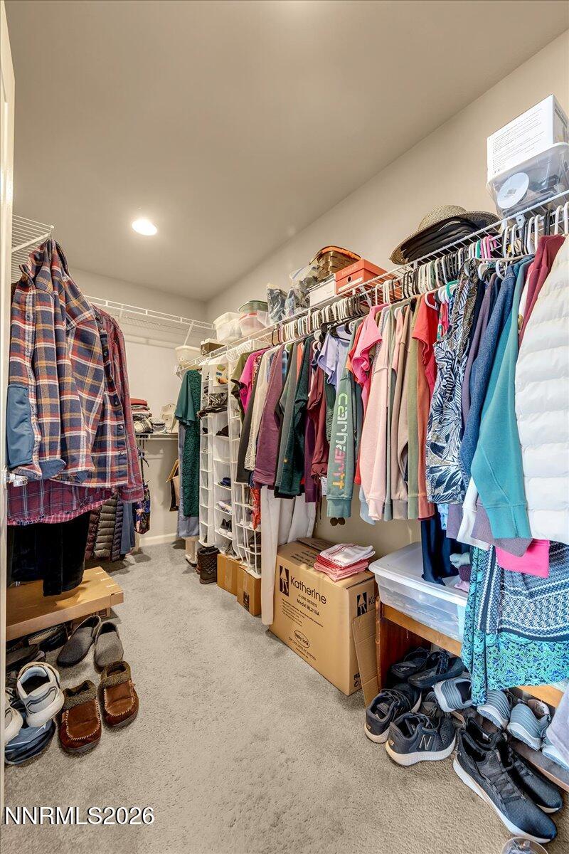 104 Bethpage Road Dayton, NV 89403 - Photo 29 of 65 a view of walk in closet with clothes and shoes