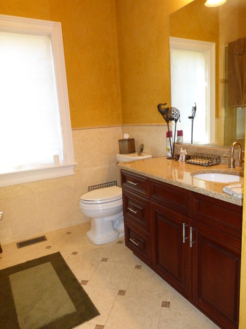 311 North Westgate Road Mount Prospect, IL 60056 - Photo 14 of 18 a bathroom with a sink and a mirror