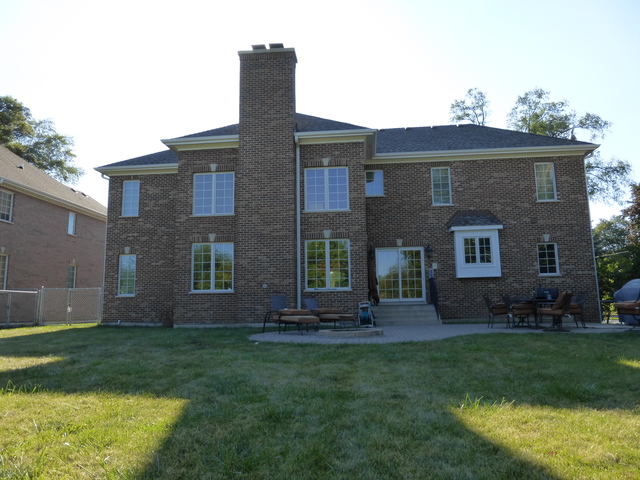 311 North Westgate Road Mount Prospect, IL 60056 - Photo 17 of 18 a front view of a house with a yard