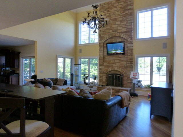 311 North Westgate Road Mount Prospect, IL 60056 - Photo 3 of 18 a living room with furniture a fireplace and a flat screen tv