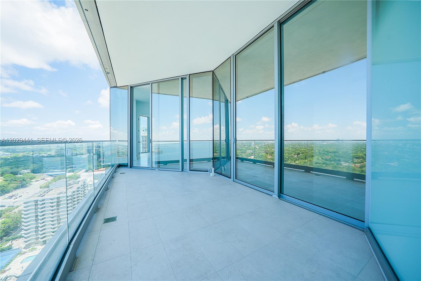 175 Southeast 25th Road, Unit 2103 Miami, FL 33129 - Photo 23 of 27 a view of an ocean from balcony