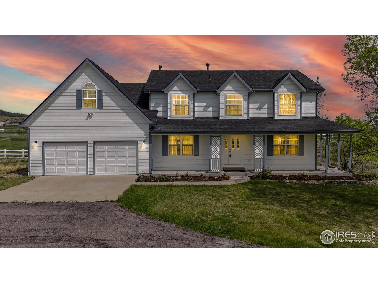 5306 Foothills Drive Berthoud, CO 80513 - Photo 5 of 40 a house view with a garden space
