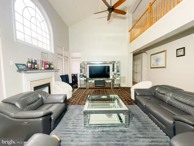 a living room with furniture or couch and a flat screen tv