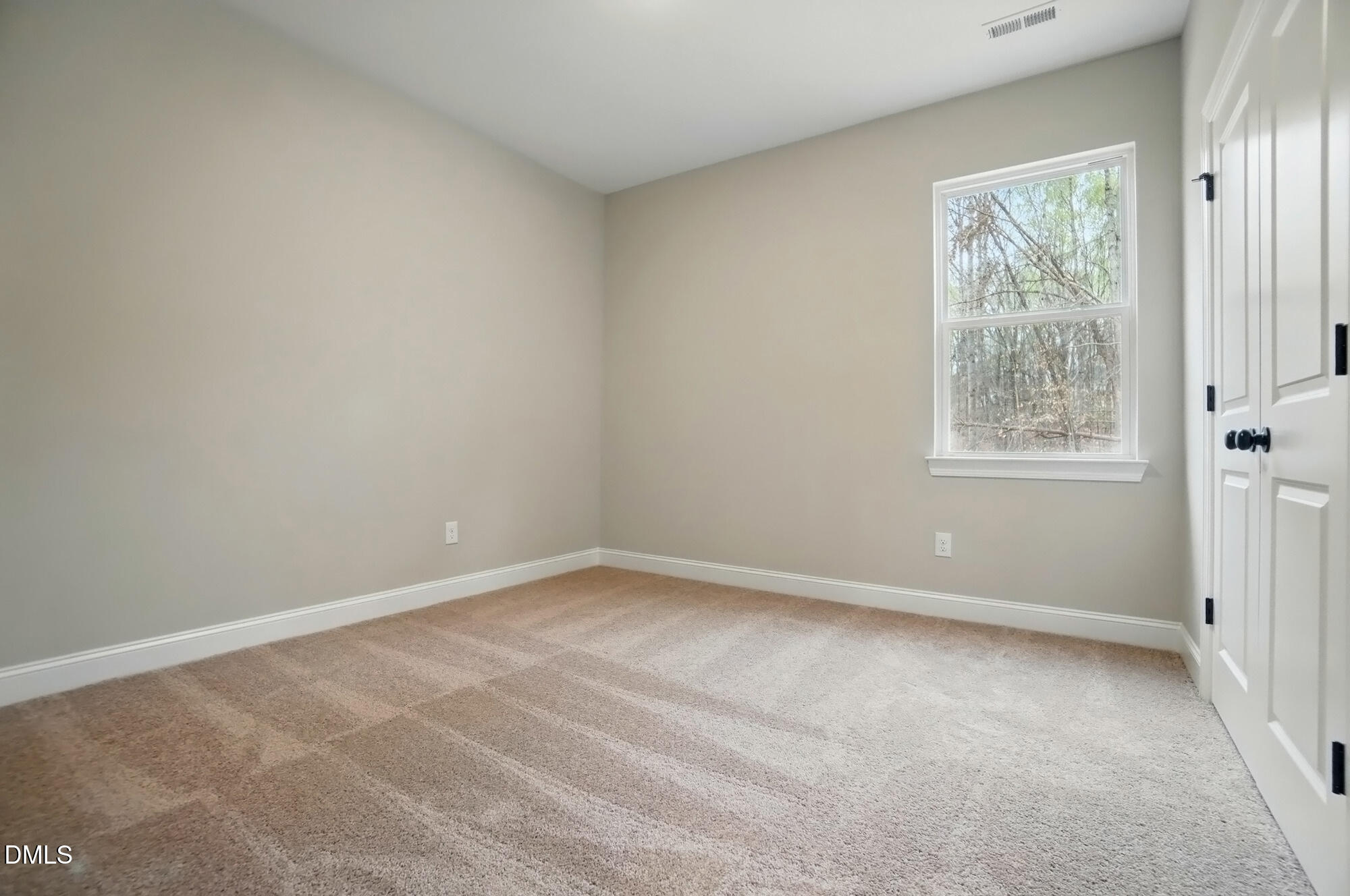 285 Gilliland Road Siler City, NC 27344 - Photo 26 of 45 an empty room with a window