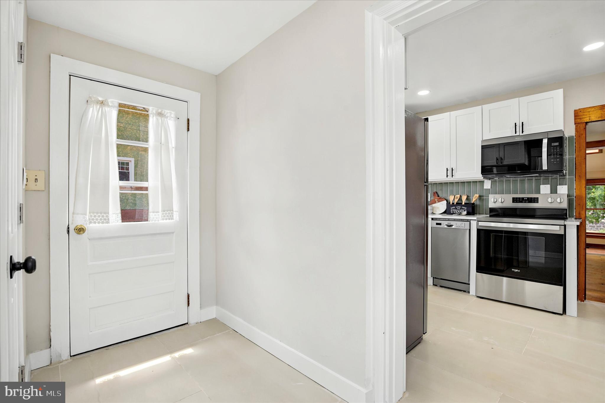 3131 Bedminster Road Ottsville, PA 18942 - Photo 7 of 23 a view of kitchen with microwave and stove