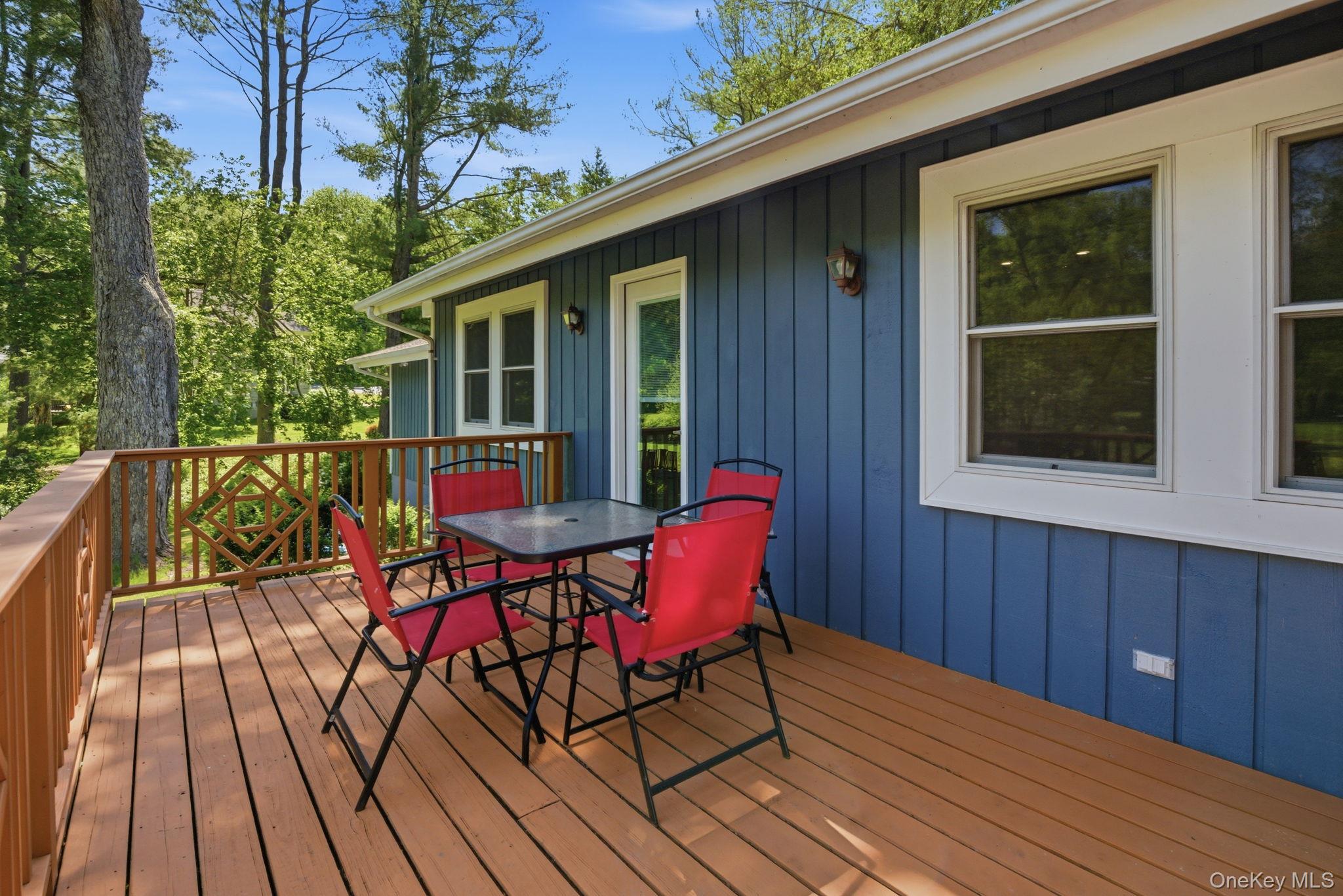 35 Deans Bridge Road Somers, NY 10589 - Photo 25 of 49 Step out back to a deck made for slow summer mornings and easy dinners under the trees.