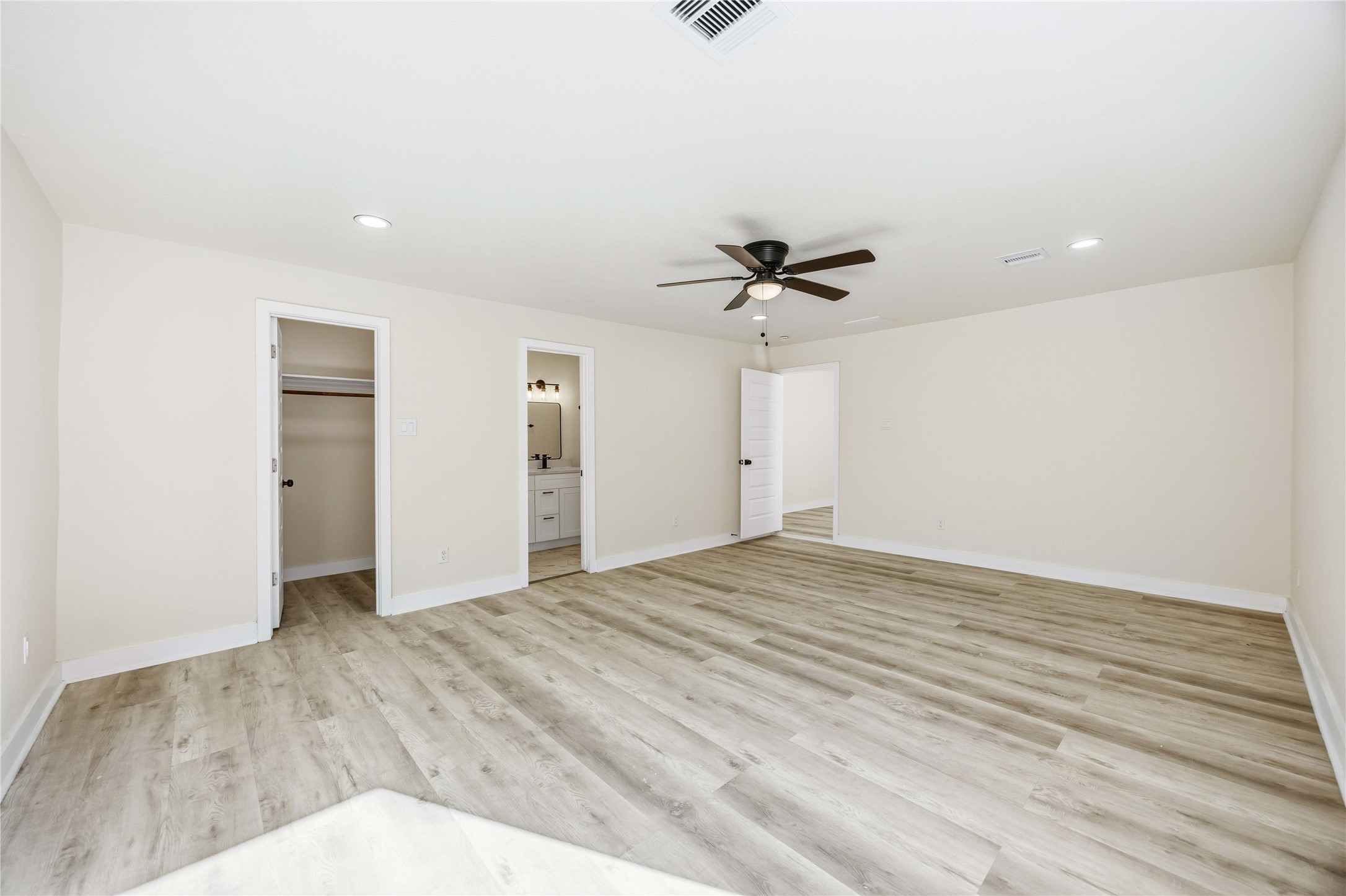 18234 Atkinson Lane Conroe, TX 77384 - Photo 13 of 30 a view of a livingroom with a ceiling fan