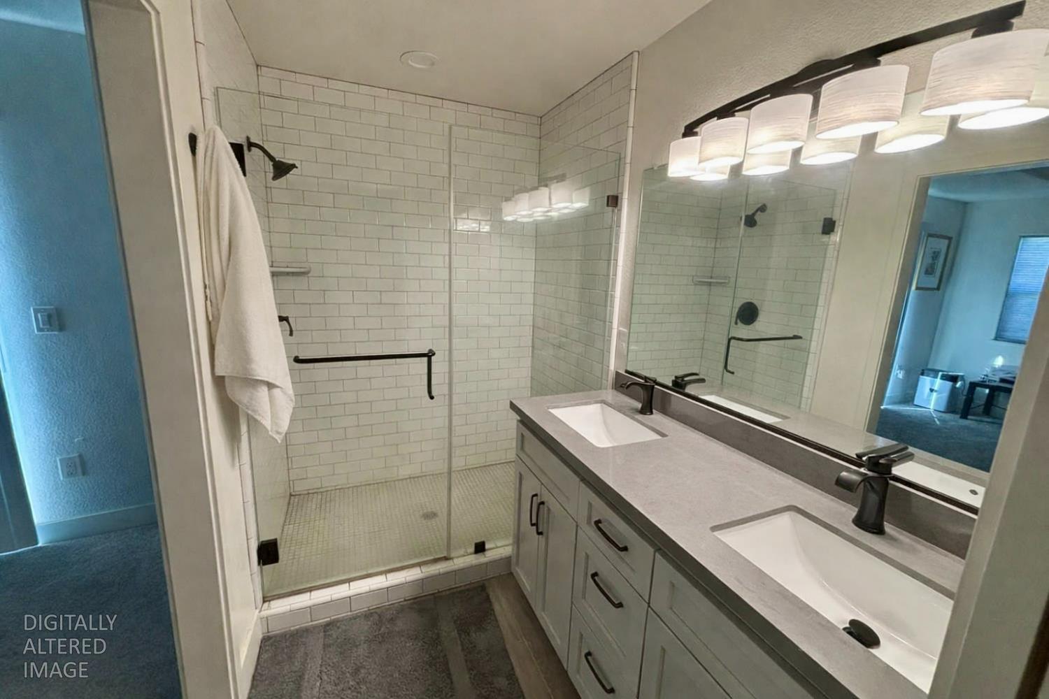 2481 Quail Hill Road Copperopolis, CA 95228 - Photo 12 of 23 a bathroom with a shower sink and mirror