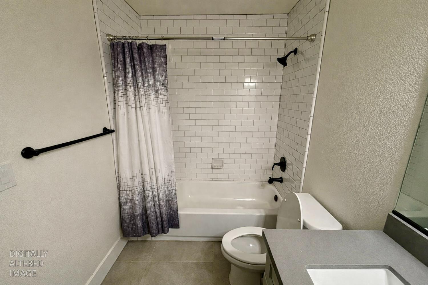 2481 Quail Hill Road Copperopolis, CA 95228 - Photo 17 of 23 a bathroom with a toilet and a shower