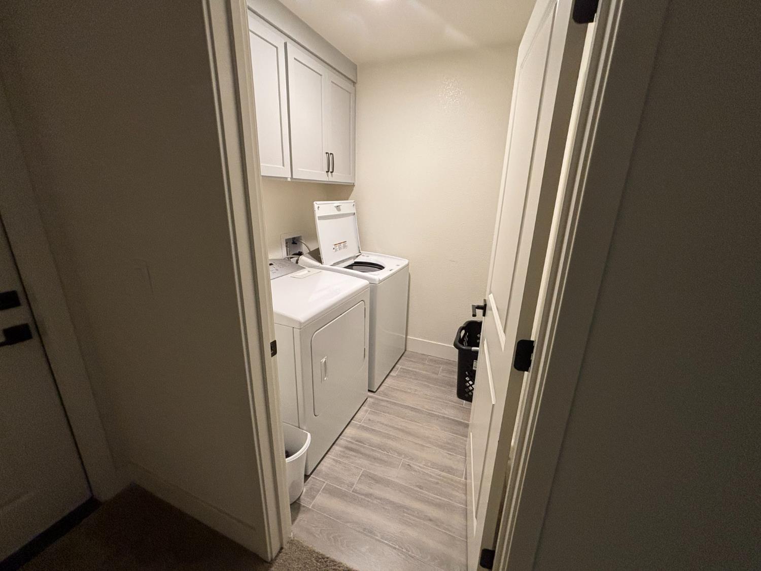 2481 Quail Hill Road Copperopolis, CA 95228 - Photo 18 of 23 a bathroom with sink a washer and dryer