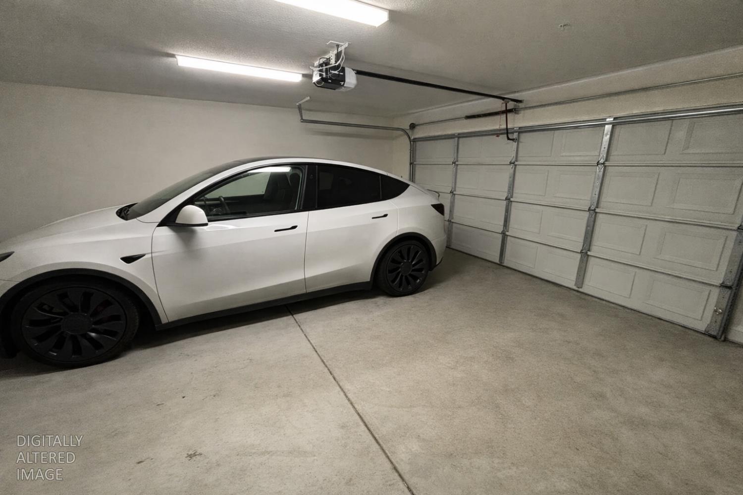 2481 Quail Hill Road Copperopolis, CA 95228 - Photo 19 of 23 a view of a car garage