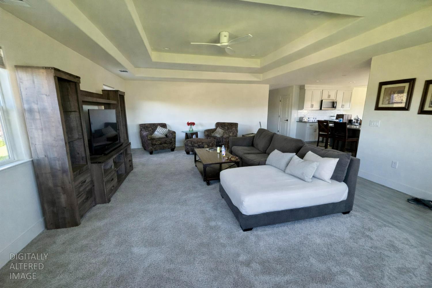 2481 Quail Hill Road Copperopolis, CA 95228 - Photo 8 of 23 a living room with furniture and a flat screen tv