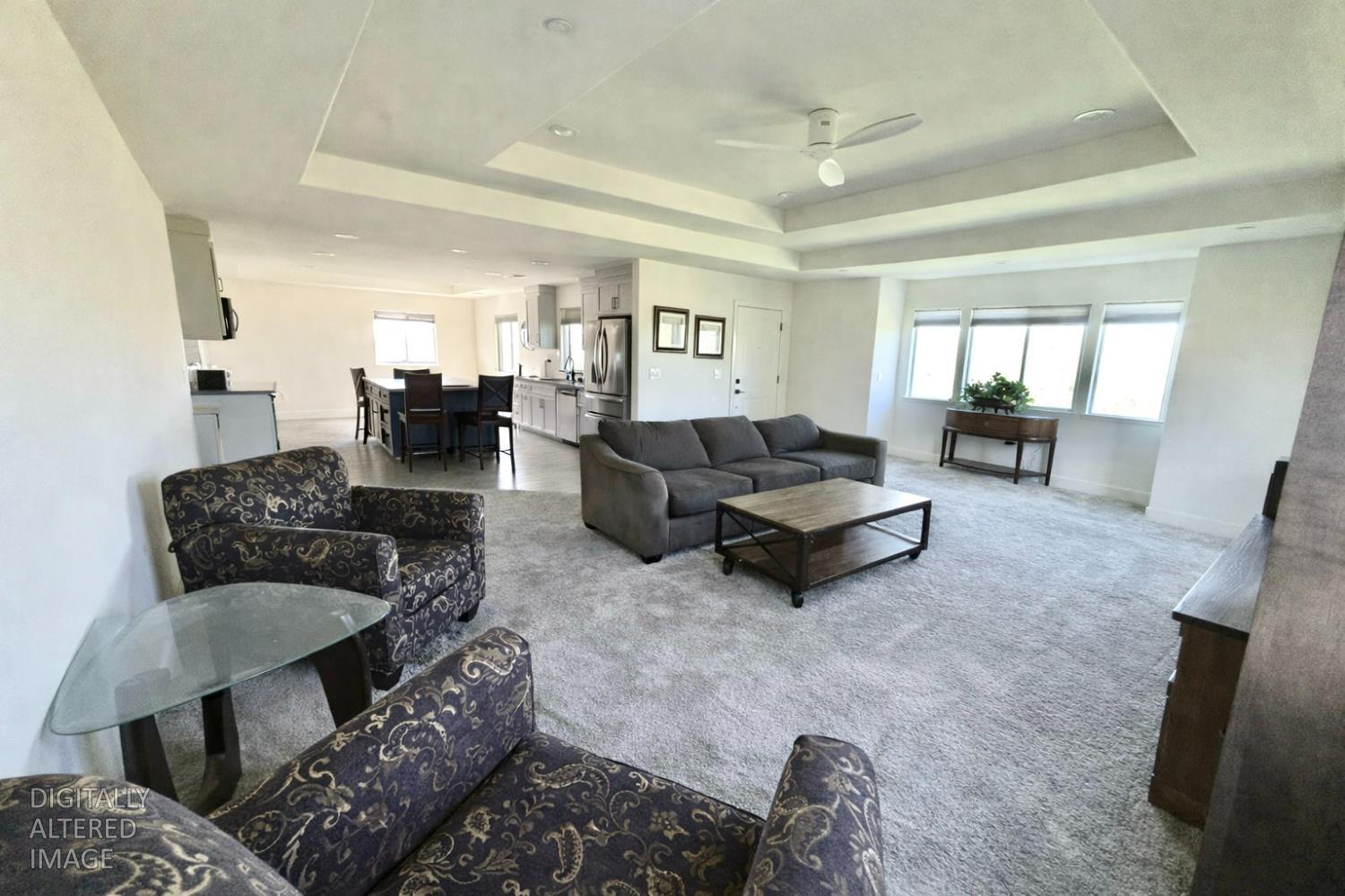2481 Quail Hill Road Copperopolis, CA 95228 - Photo 9 of 23 a living room with furniture and a large window