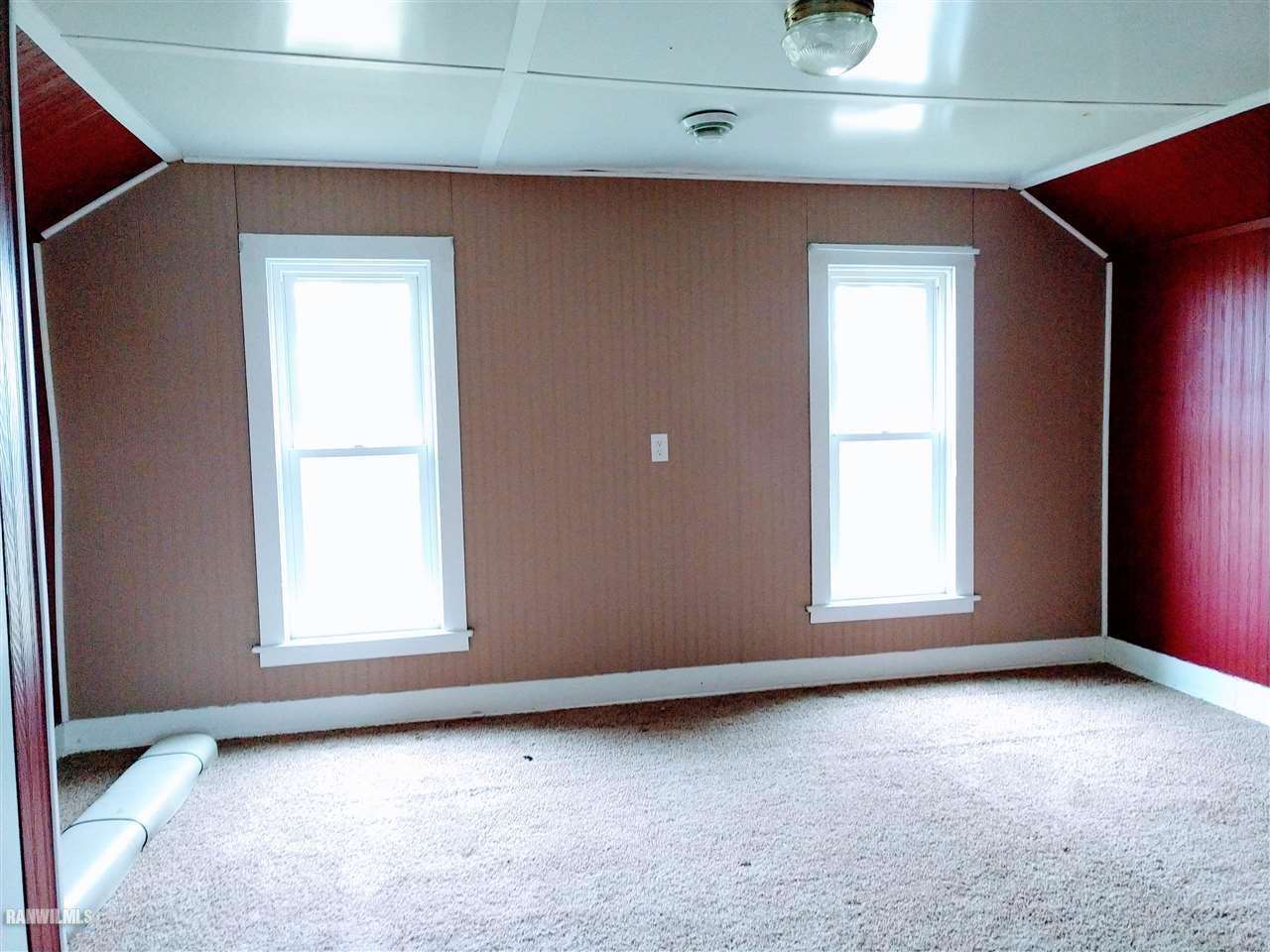 19183 Thomson Road Chadwick, IL 61014 - Photo 13 of 17 an empty room with a window