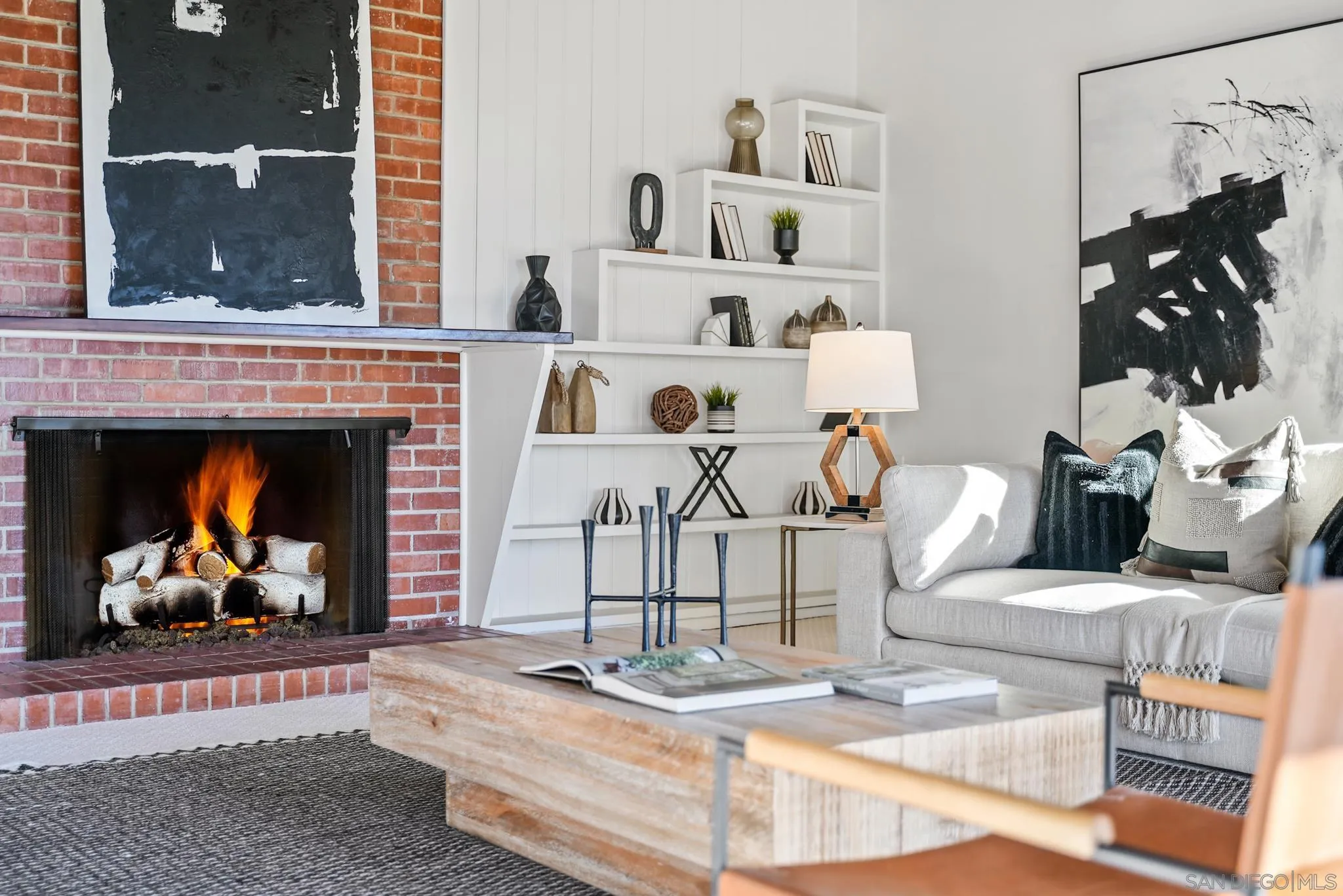 6423 Avenida Cresta La Jolla, CA 92037 - Photo 14 of 33 a living room with furniture and a fireplace