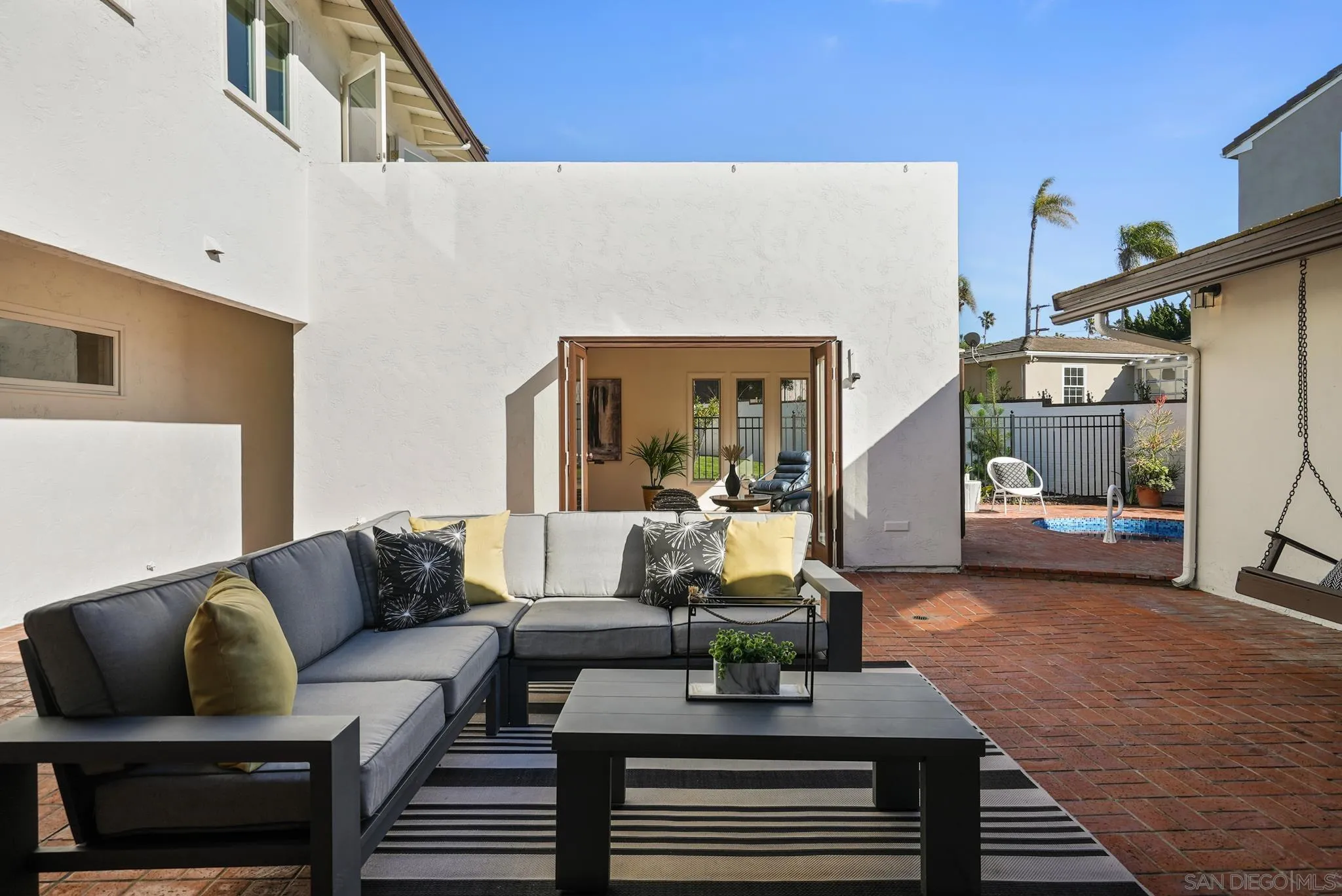 6423 Avenida Cresta La Jolla, CA 92037 - Photo 22 of 33 a living room with furniture and a couch