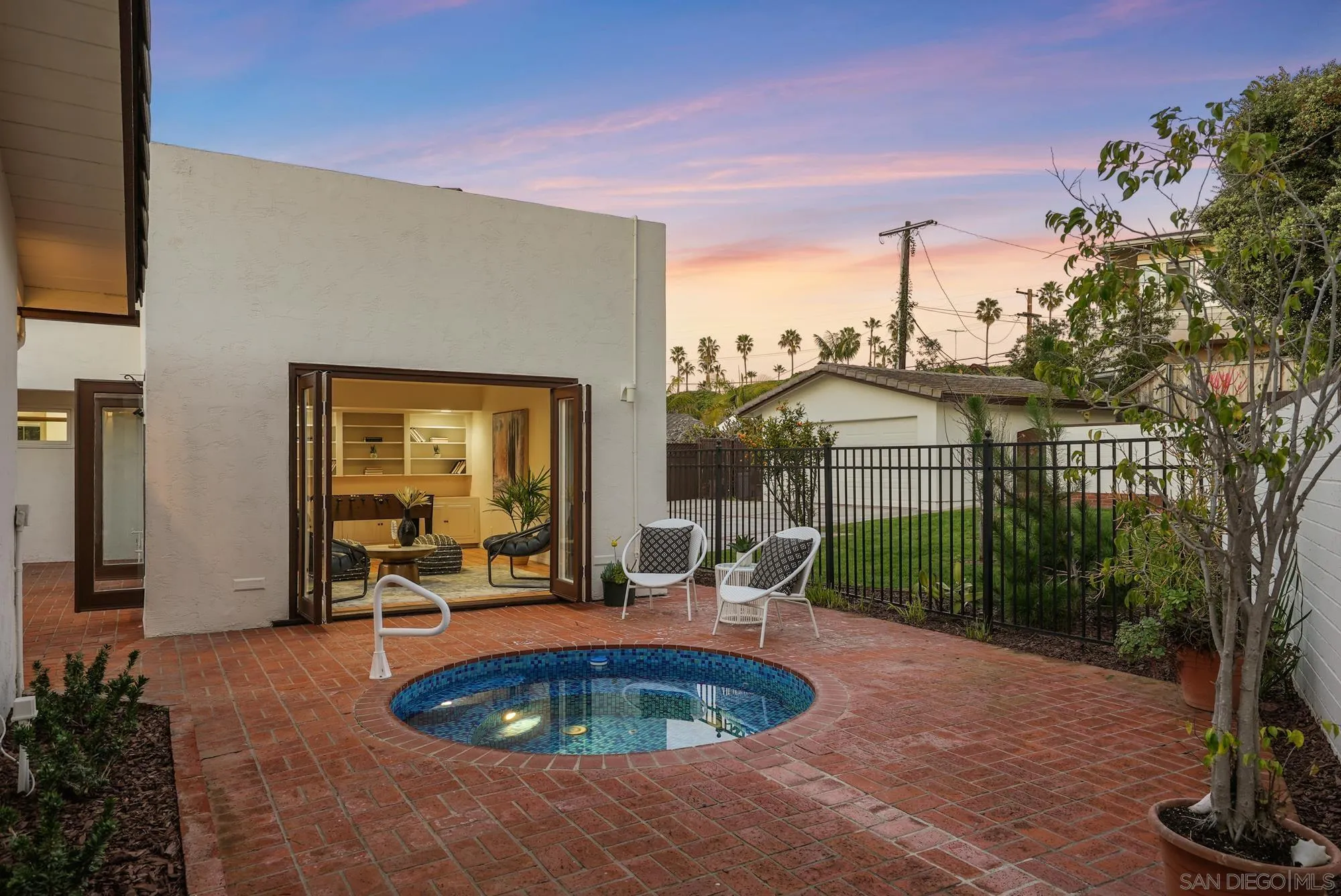 6423 Avenida Cresta La Jolla, CA 92037 - Photo 23 of 33 a view of a swimming pool with a patio