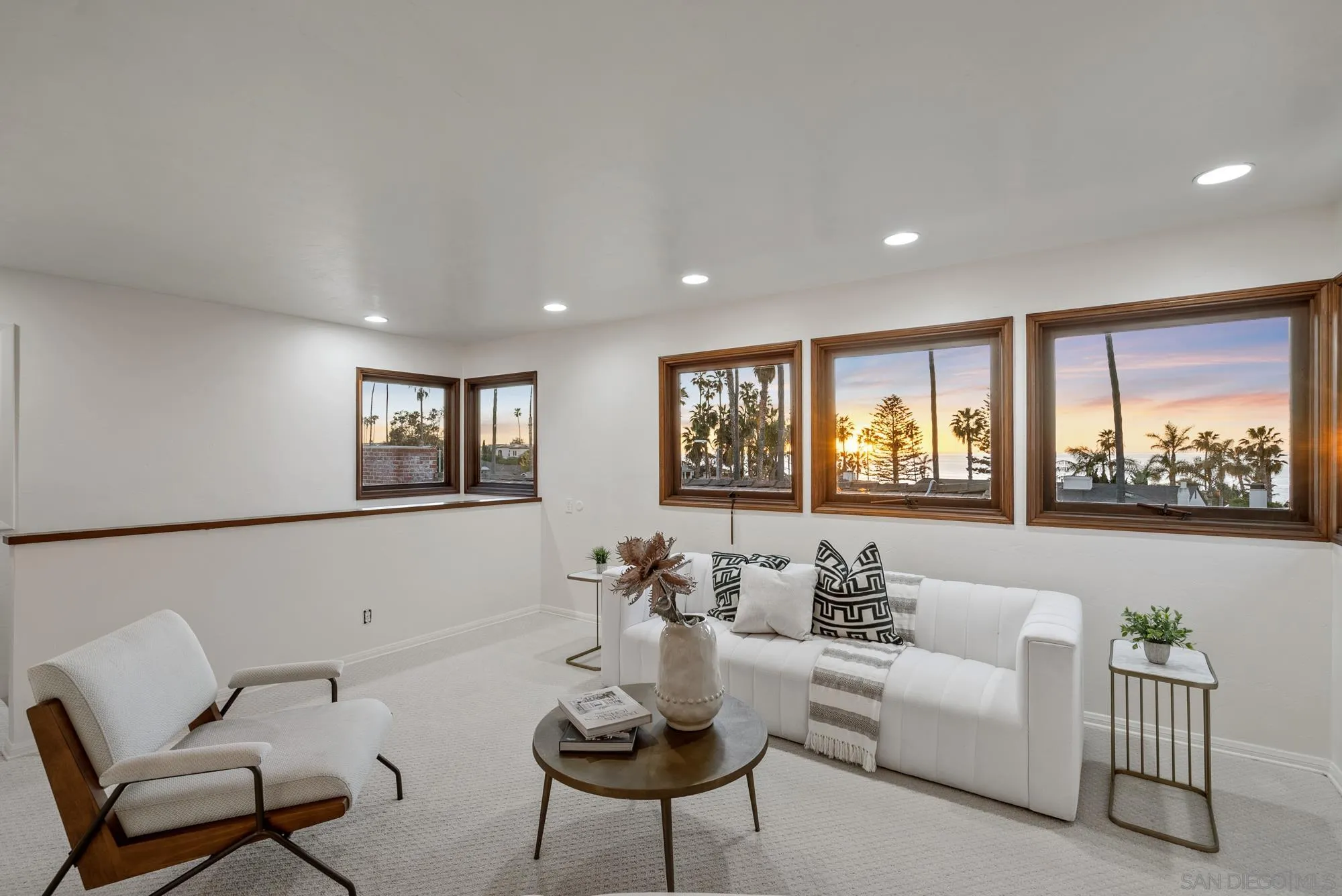 6423 Avenida Cresta La Jolla, CA 92037 - Photo 7 of 33 a living room with furniture and a large window