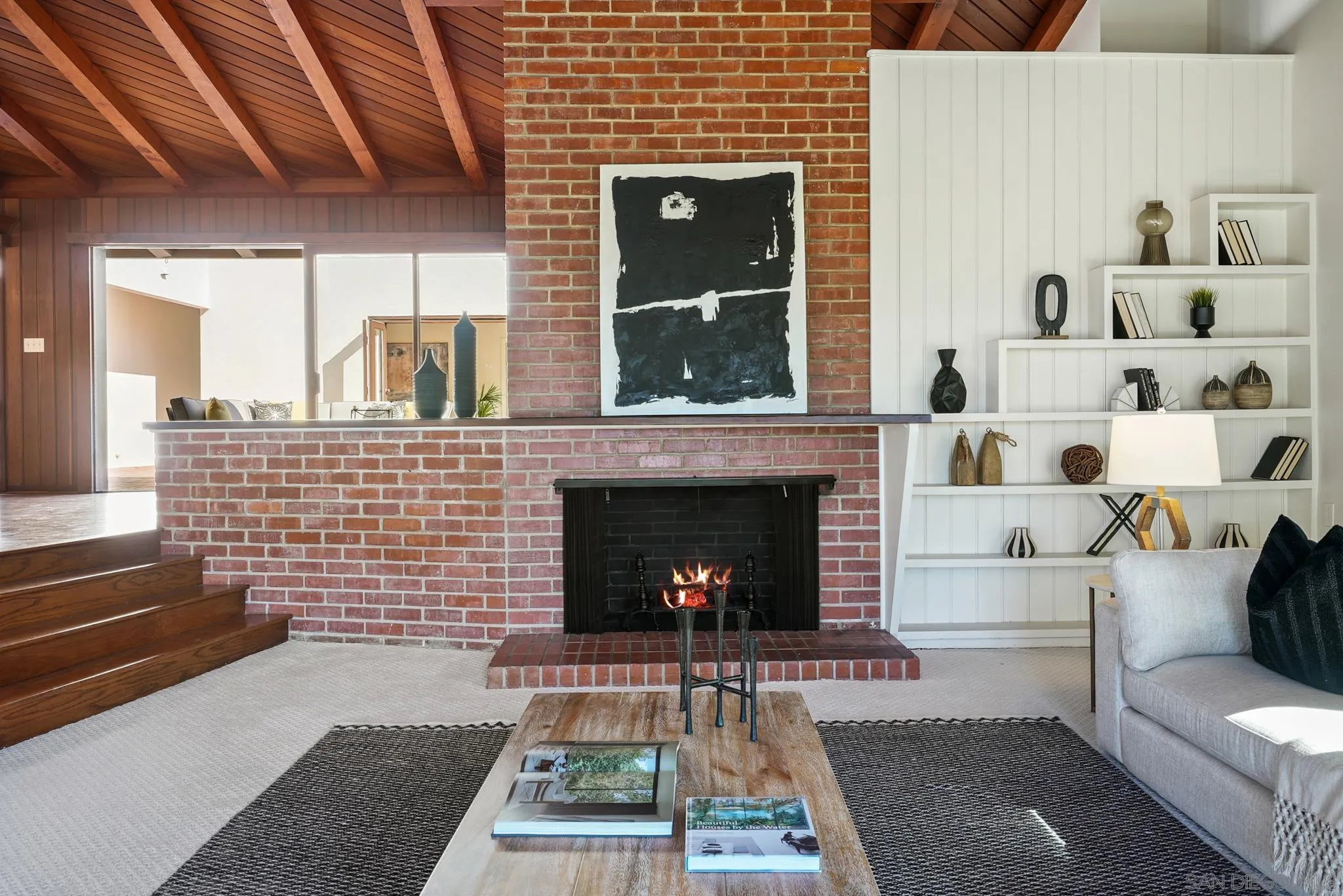 6423 Avenida Cresta La Jolla, CA 92037 - Photo 8 of 33 a living room with furniture and a fireplace