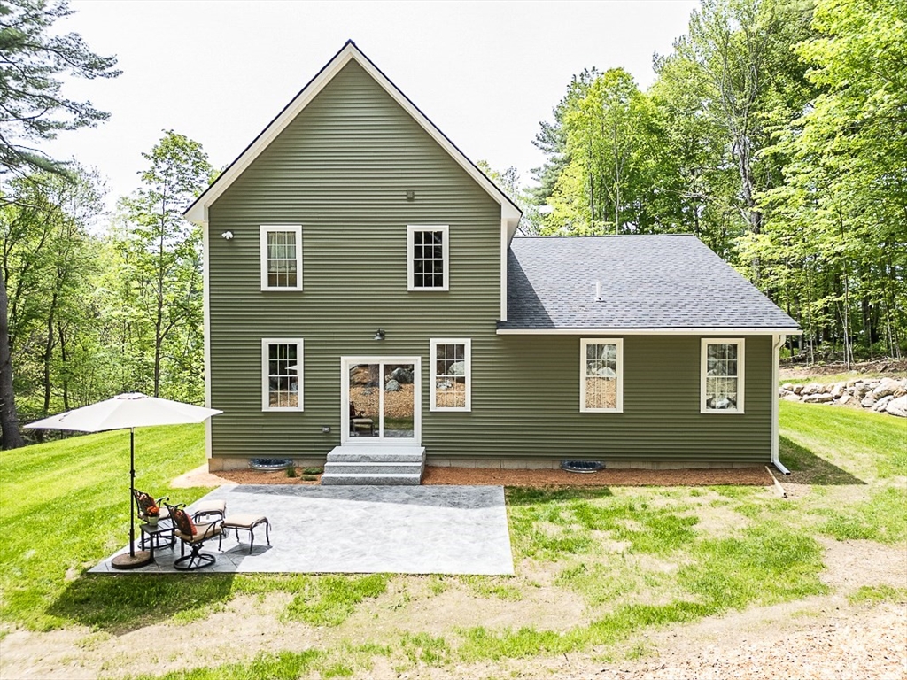 531 Clark Street Gardner, MA 01440 - Photo 36 of 42 a front view of a house with a yard