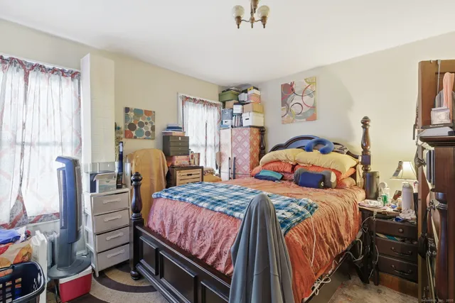 a bedroom with a bed and a closet