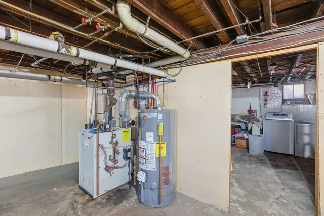 a view of storage and utility room with a lot of stuff