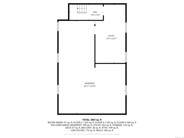 a black and white photo of a bench in a room