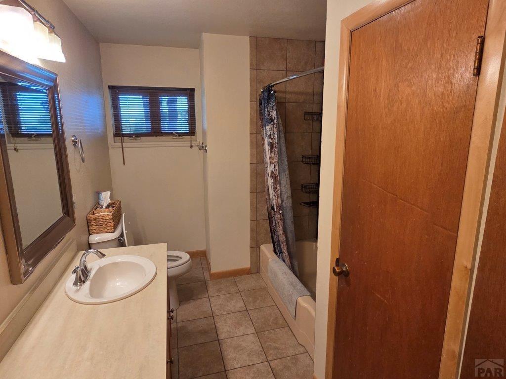 1000 Rittgers Street Eads, CO 81036 - Photo 15 of 33 a bathroom with a sink a toilet and shower