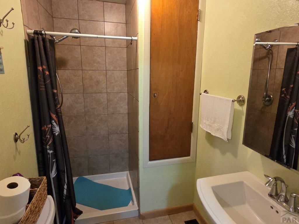 1000 Rittgers Street Eads, CO 81036 - Photo 24 of 33 a bathroom with a sink and a tub