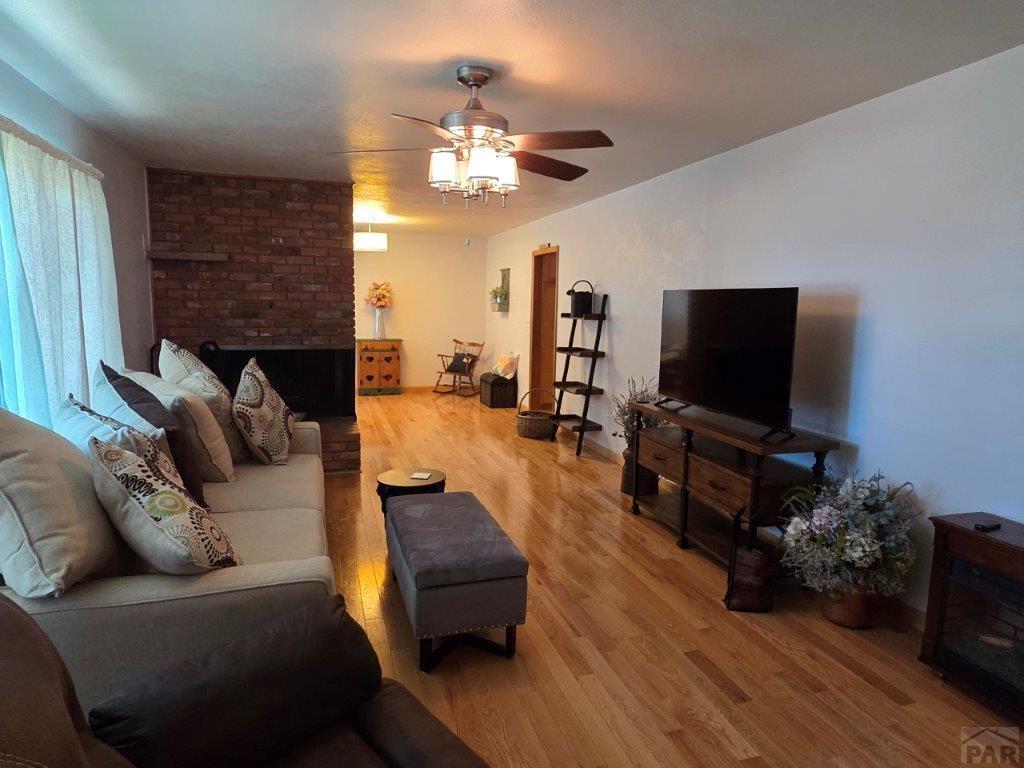 1000 Rittgers Street Eads, CO 81036 - Photo 3 of 33 a living room with furniture and a flat screen tv