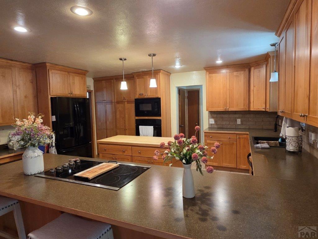1000 Rittgers Street Eads, CO 81036 - Photo 9 of 33 a view of a living room and dining room