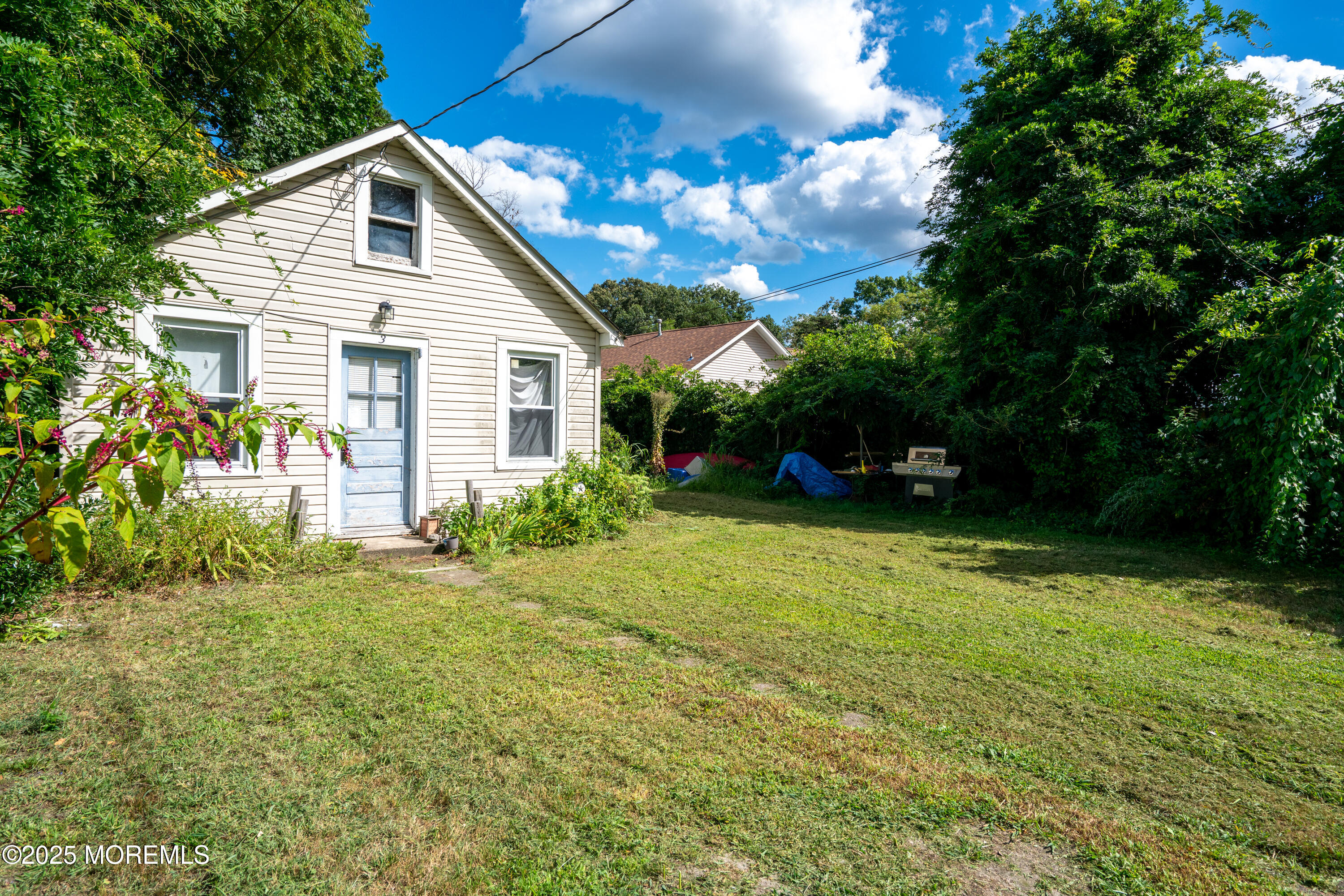 a house view with a garden space