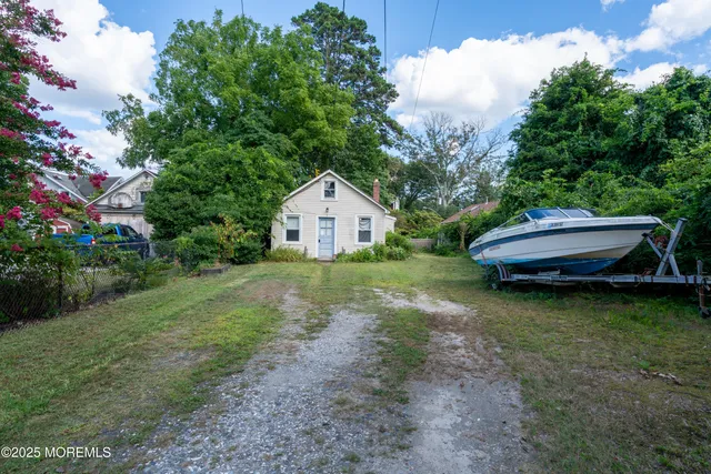 a house view with a garden space
