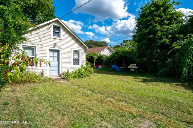 a house view with a garden space