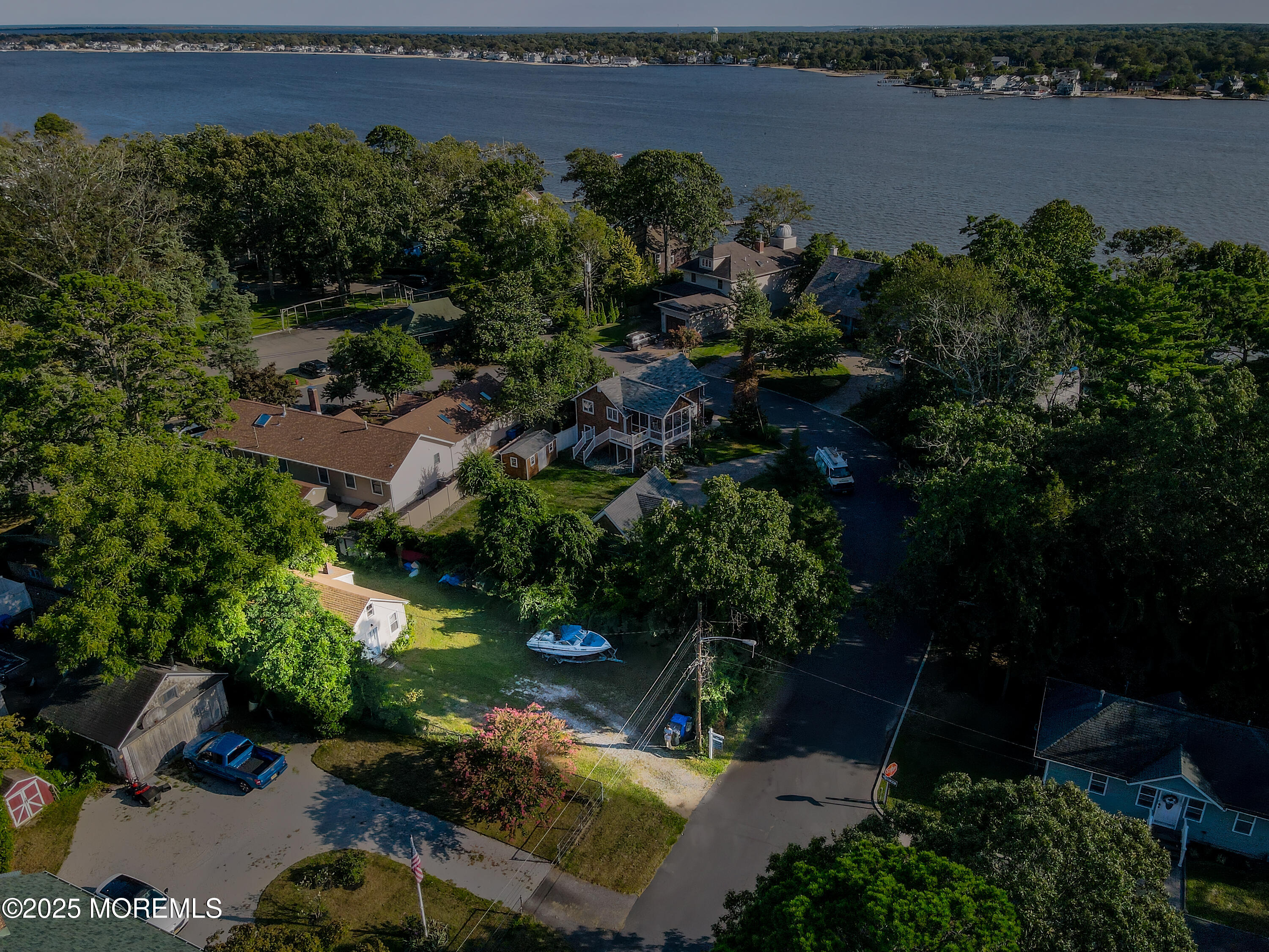 3 Highland Avenue Island Heights, NJ 08732 - Photo 6 of 19 an aerial view of a house with a garden and lake view