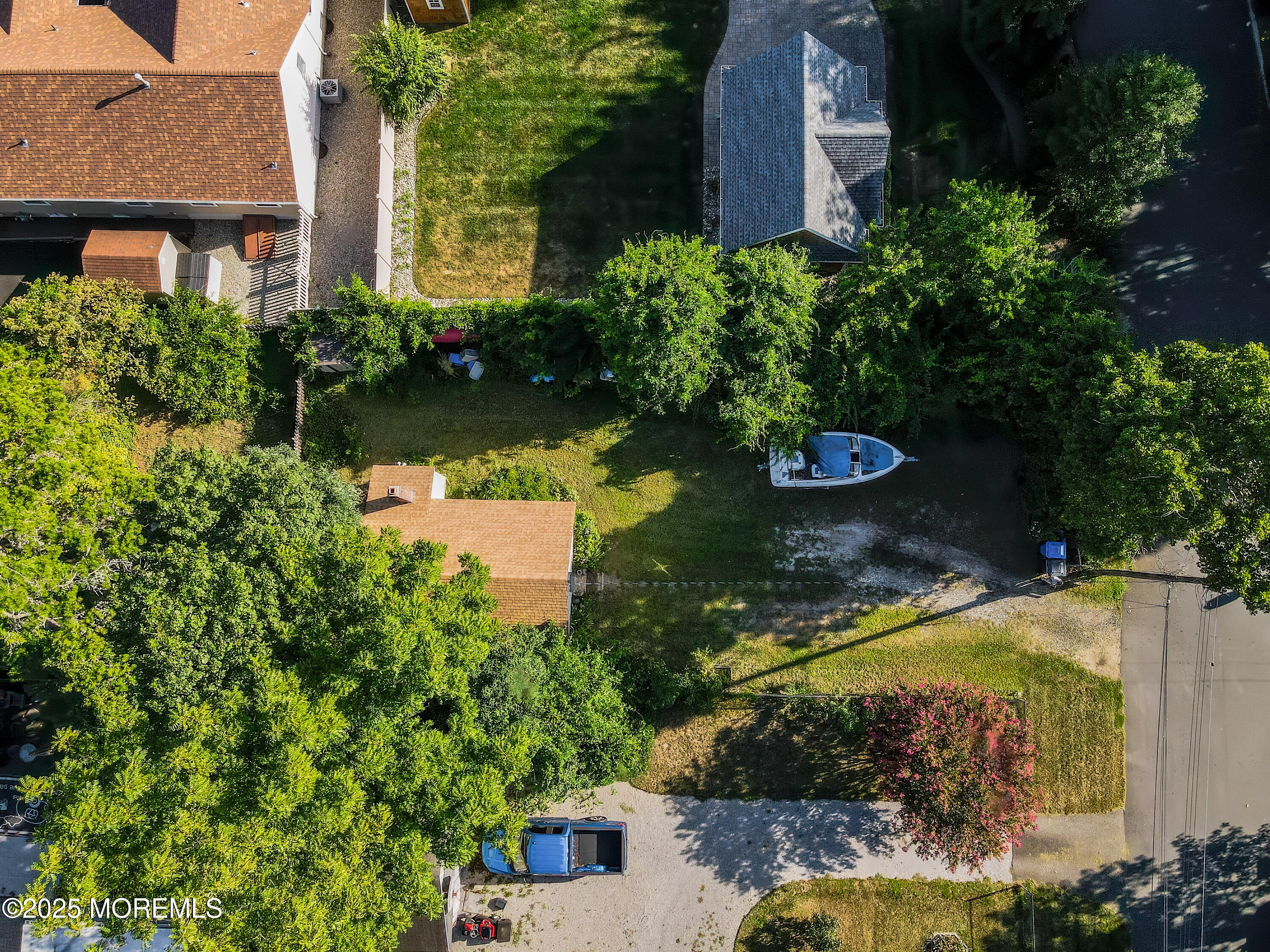 3 Highland Avenue Island Heights, NJ 08732 - Photo 8 of 19 an aerial view of a house with a yard and lake view