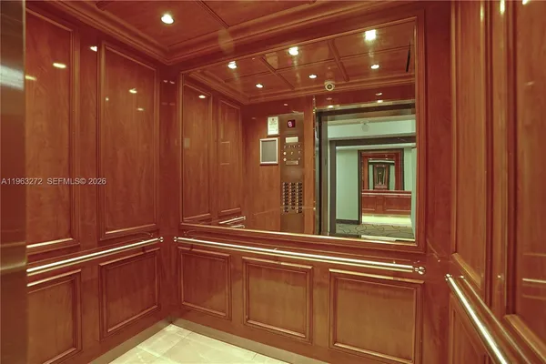 a view of elevator with hallway