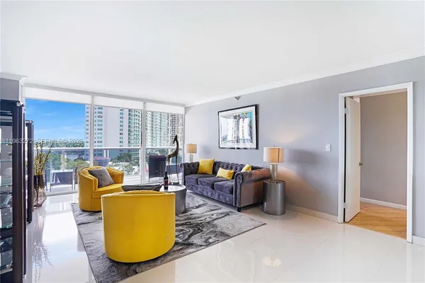 a living room with furniture and a window