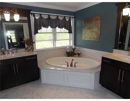2 Whitman Way Lincoln, RI 02865 - Photo 12 of 20 Master Bath/Spa. Pocket doors ensuite open to master bath with double vanities, marble tile, separate shower stall with frameless glass.
