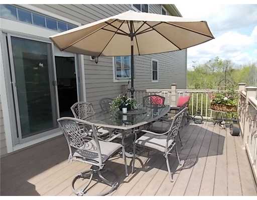 2 Whitman Way Lincoln, RI 02865 - Photo 2 of 20 Exterior Back. Trex deck off kitchen dining area.