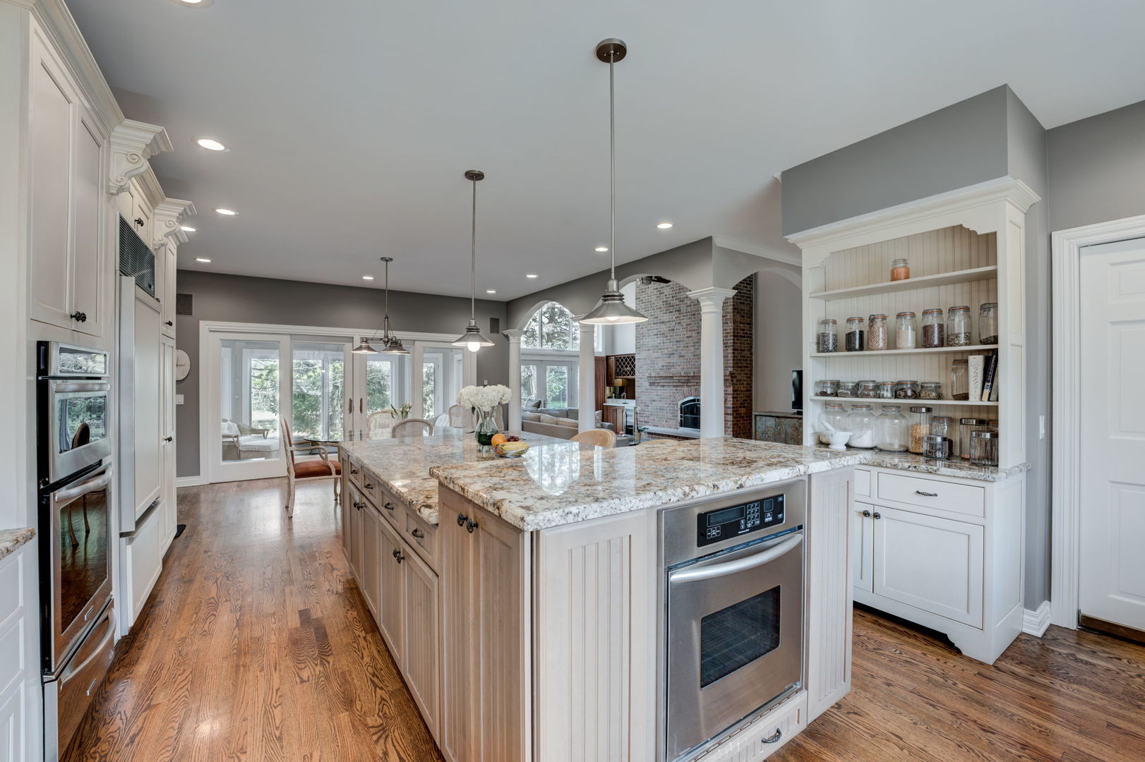 791 South Ridge Road Lake Forest, IL 60045 - Photo 12 of 40 a kitchen with stainless steel appliances granite countertop a lot of counter space and wooden floors