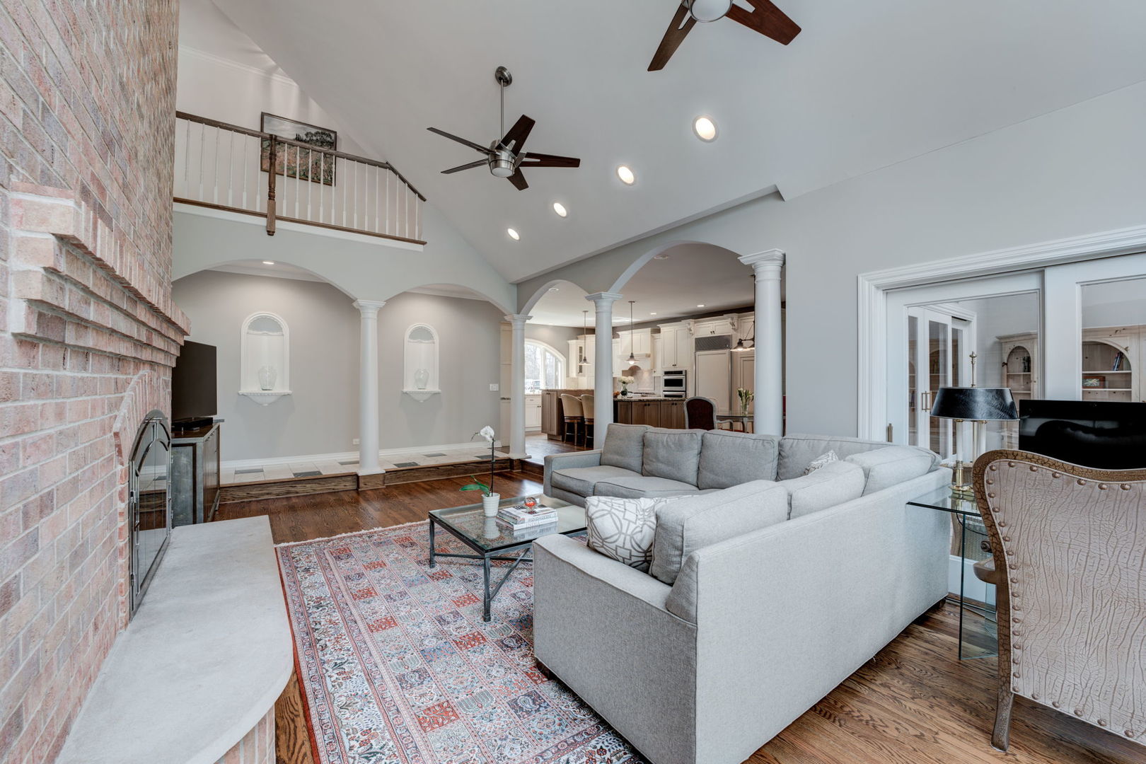791 South Ridge Road Lake Forest, IL 60045 - Photo 14 of 40 a living room with furniture and a chandelier