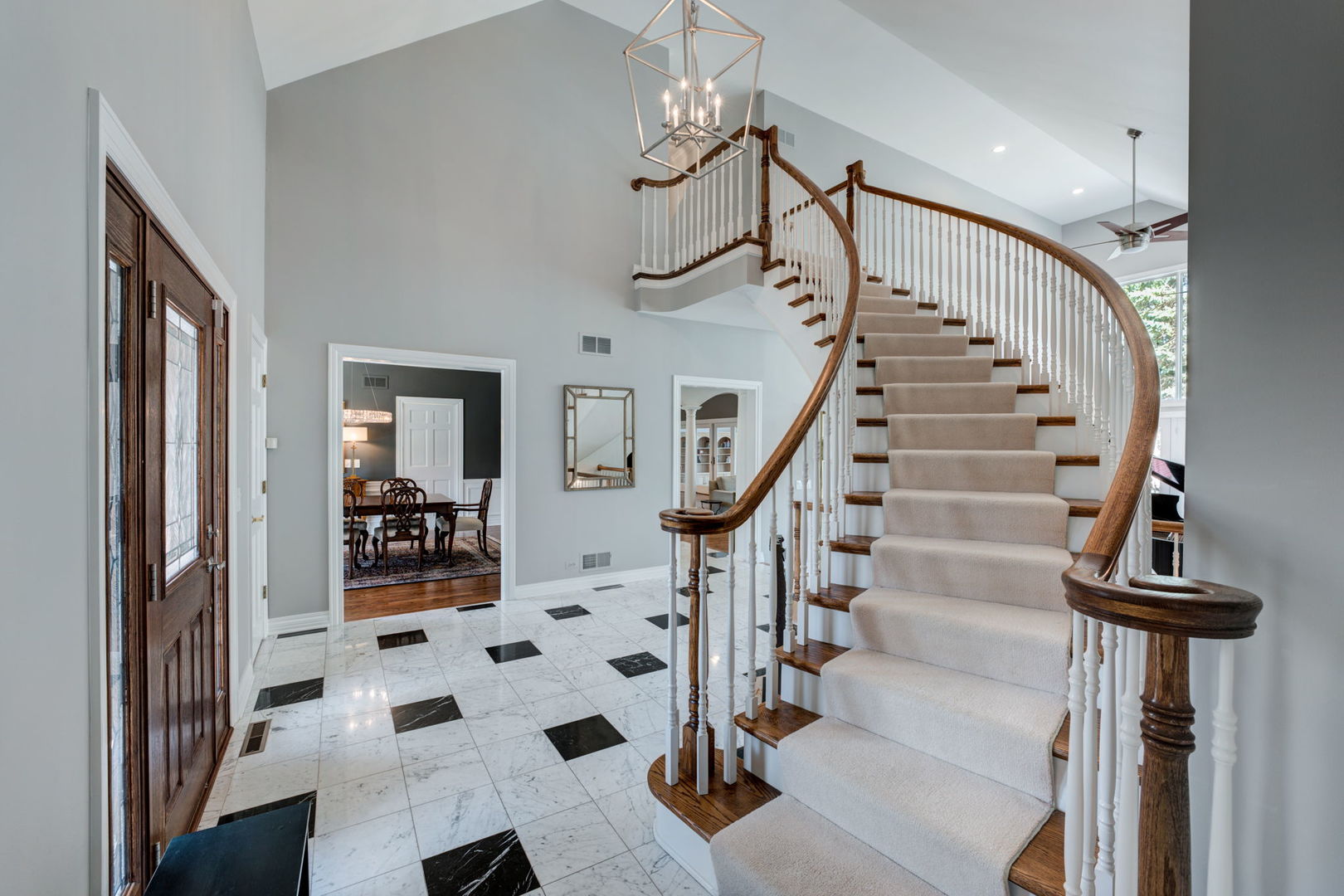 791 South Ridge Road Lake Forest, IL 60045 - Photo 3 of 40 a view of entryway and hall with wooden floor