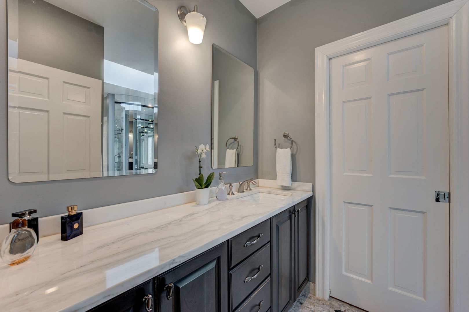 791 South Ridge Road Lake Forest, IL 60045 - Photo 21 of 40 a bathroom with a granite countertop sink and a mirror