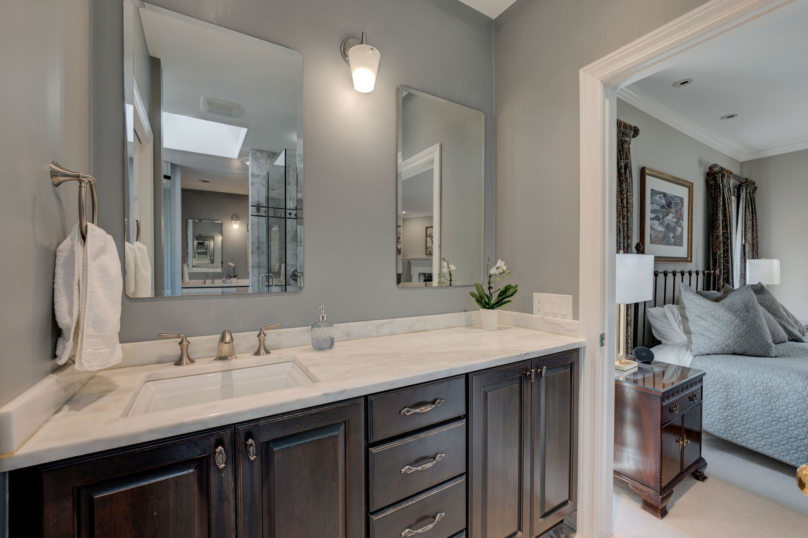 791 South Ridge Road Lake Forest, IL 60045 - Photo 22 of 40 a bathroom with a sink and a mirror