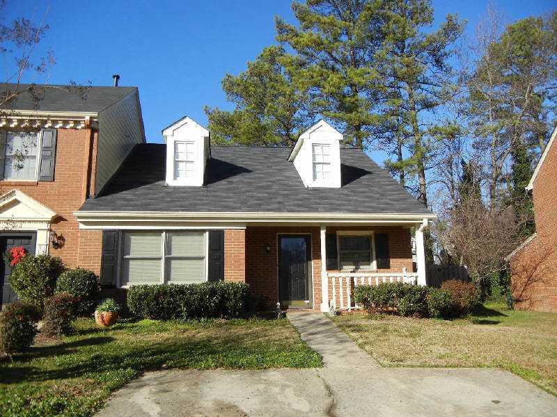 Exterior Front. Charming brick end unit