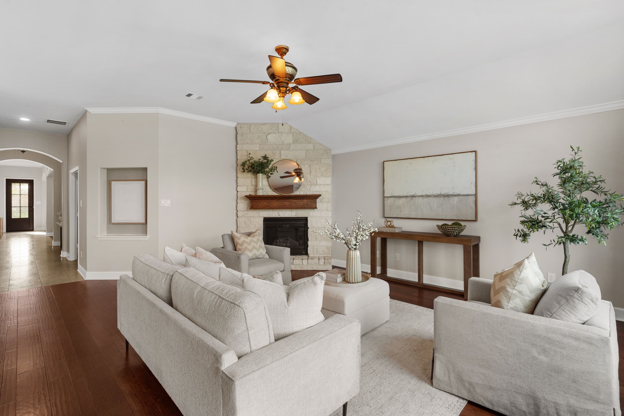 3426 Summer Ranch Drive Katy, TX 77494 - Photo 11 of 48 Designed for comfort, this spacious family room features a ceiling fan, inviting layout, and easy flow that makes it perfect for both entertaining and everyday living.